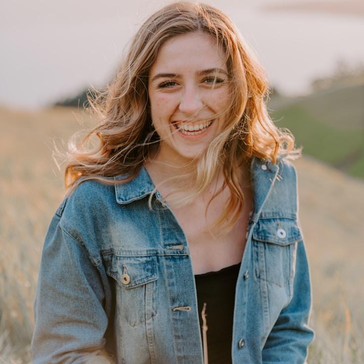 Kaveri Mehta, Lead Design Curator at DewSolarDawn, reviewing corporate floral arrangements